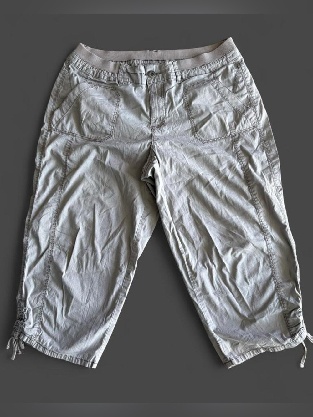 Indigo gray capri pants with adjustable waist and ankle ties, size 10